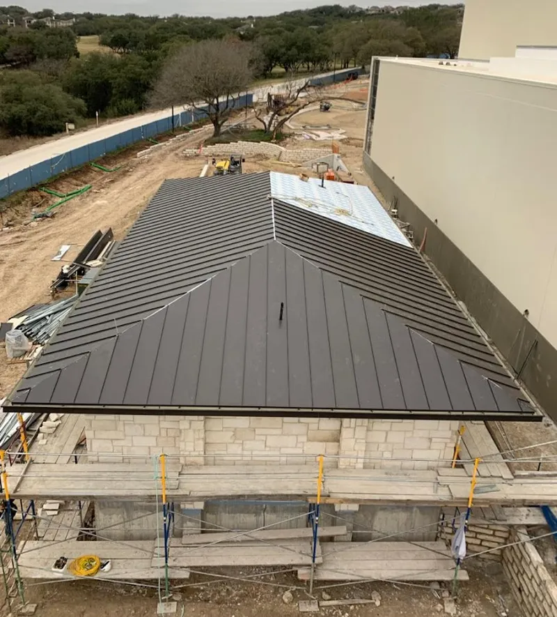 Metal roof new construction with scaffolding in Largo